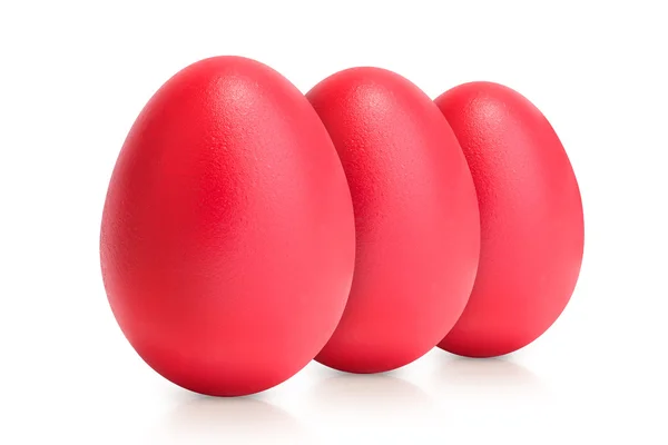 Groupe d'œufs rouges isolés sur blanc — Photo