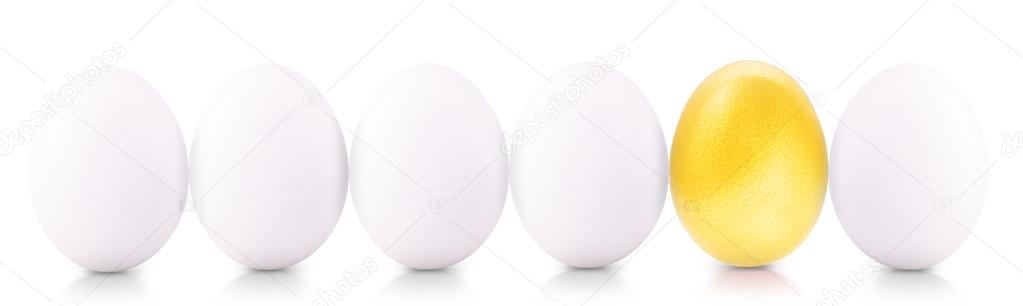 Success Symbol Concept with gold and white eggs