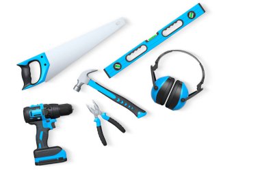 Yapı araçları, miğferler ve güvenlik teçhizatlarının toplanması, kırpma yolu ile beyaz arka planda izole edilmiş, iş güvenliğini sembolize ediyor ve sanayiyi inşa ediyor