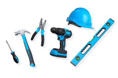 Yapı araçları, miğferler ve güvenlik teçhizatlarının toplanması, kırpma yolu ile beyaz arka planda izole edilmiş, iş güvenliğini sembolize ediyor ve sanayiyi inşa ediyor