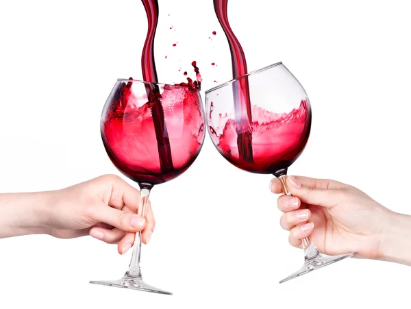 Szklanki czerwonego wina z plamami w ręku na białym tle — Zdjęcie stockowe