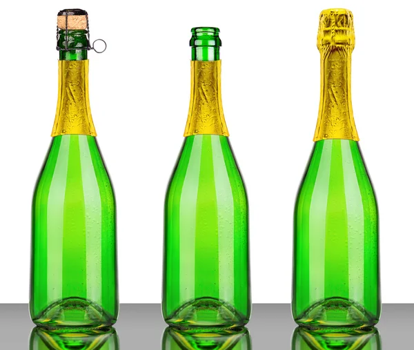 Garrafas de champanhe com cortiça isolada em branco — Fotografia de Stock