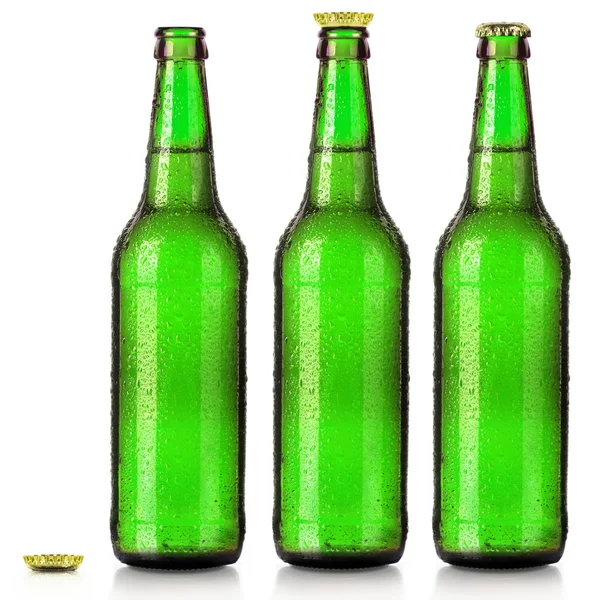 Set di bottiglie di birra con gocce ghiacciate isolate — Foto Stock