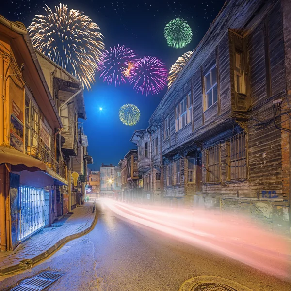 Beautiful fireworks above old streets of Istanbul by night