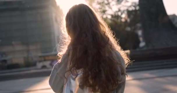 Portrait of beautiful trendy woman smiling at camera looking confident running hand through hair enjoying urban city lifestyle real people series — Stock Video