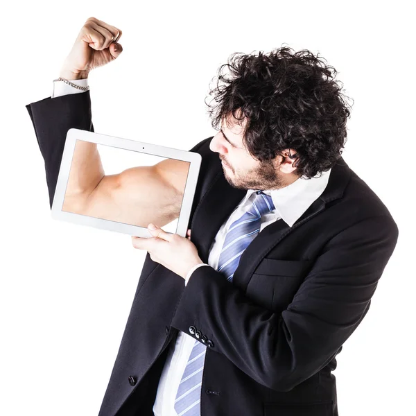 Muscular businessman with tablet — Stock Photo, Image