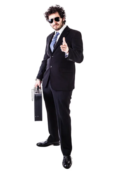 Cool businessman with black suitcase — Stock Photo, Image