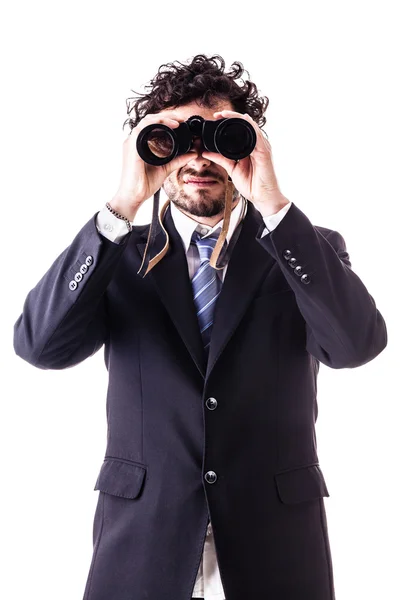 Empresário olhando com binóculos — Fotografia de Stock