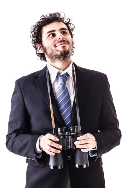 Zamyšlený podnikatel s dalekohledem — Stock fotografie