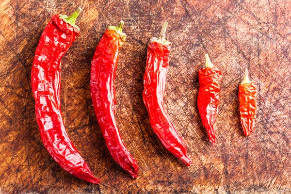 Ordered red chili peppers — Stock Photo, Image
