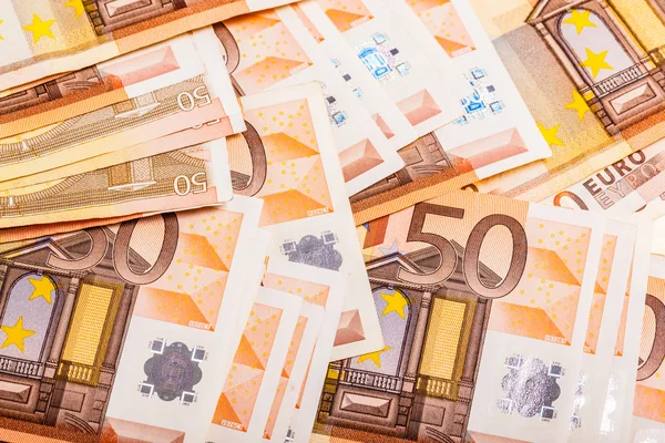 Billetes en euros amontonados —  Fotos de Stock