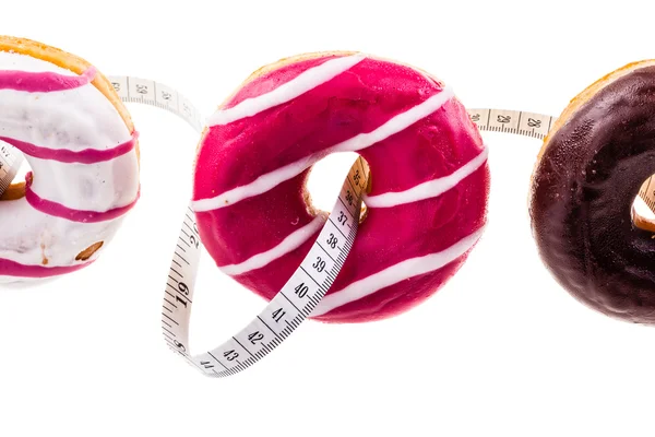 Donuts en meten tape — Stockfoto