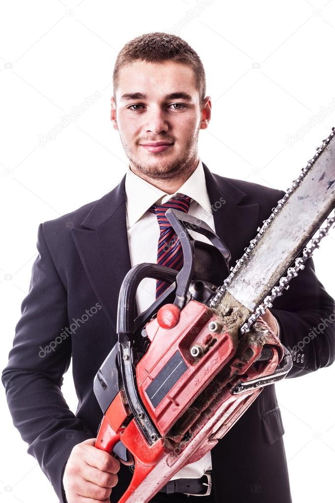 Businessman with chain saw
