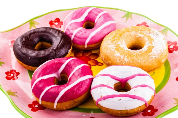 Donuts op een bord — Stockfoto