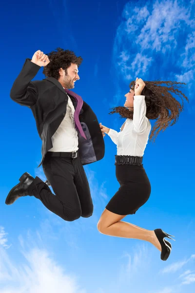 Jumping over blue sky — Stock Photo, Image