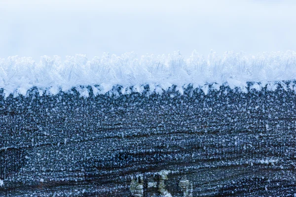 Ijs op hout — Stockfoto