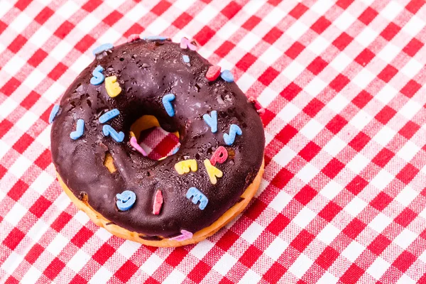 Donut with letters — Stock Photo, Image