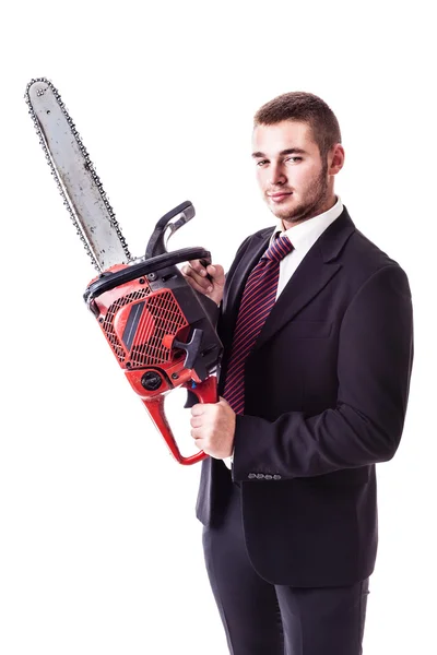 Businessman holding a red chain saw — Stock Photo, Image