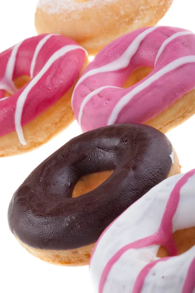 Donuts über Weiß — Stockfoto