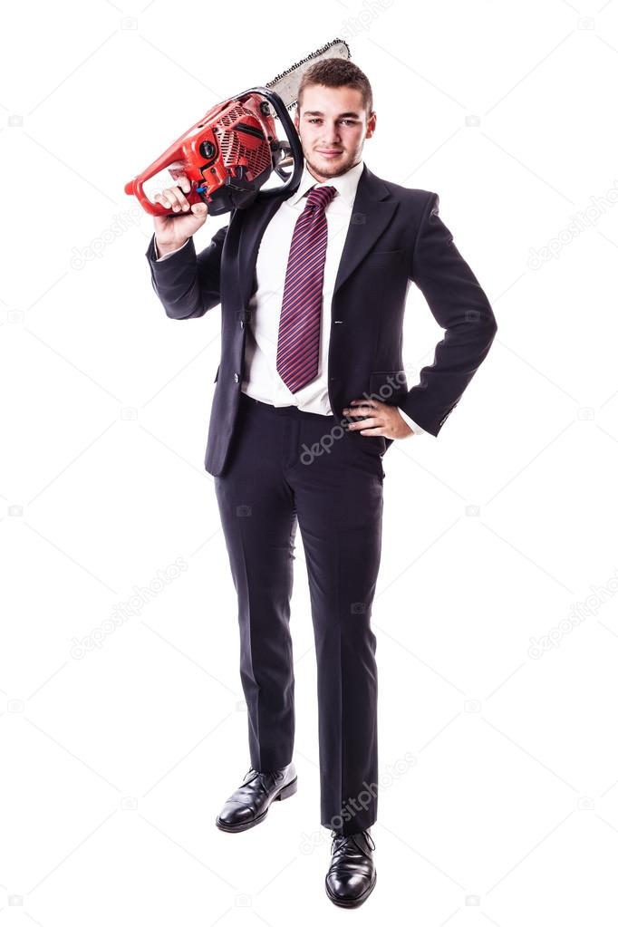 businessman holding a red chainsaw