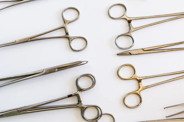 Arranged surgical pliers — Stock Photo, Image