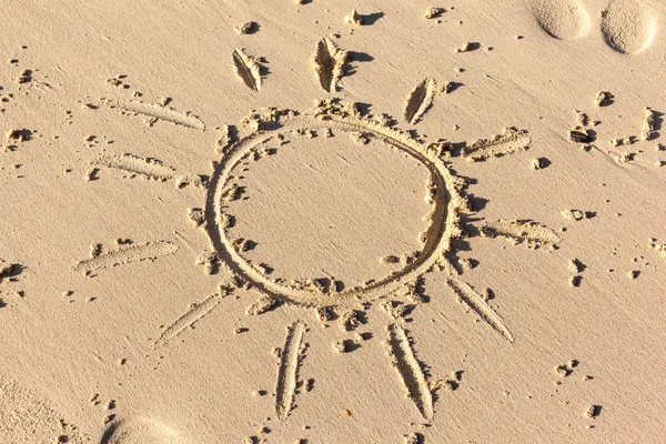 Sun drawing on the sand — Stock Photo, Image