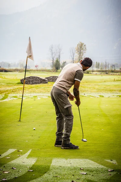 Golfspelare på gröna — Stockfoto