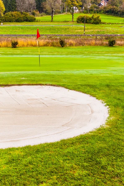 Sand trap near the hole — Stock Photo, Image