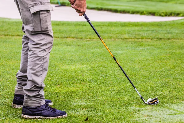 Jugando en un club de hierro — Foto de Stock