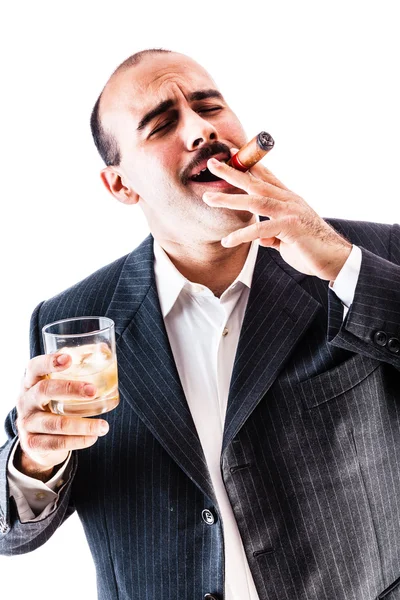 Businessman Smoking a cigar — Stock Photo, Image