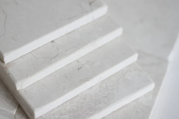 Light Grey or white marble stone background. Grey marble,quartz texture backdrop. Wall and panel marble natural pattern, Stone samples on light background for architecture 