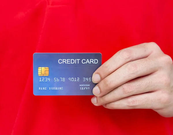 Blue Credit Card Hand Employee Red Uniform Close — Stock Photo, Image