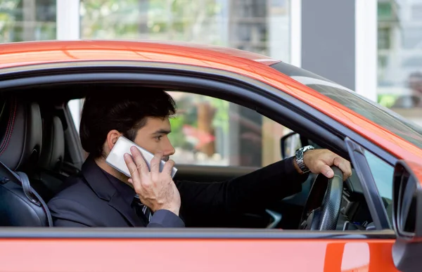 Young Businessman Black Suit Using Mobile Phone While Holding Car — Stock Photo, Image