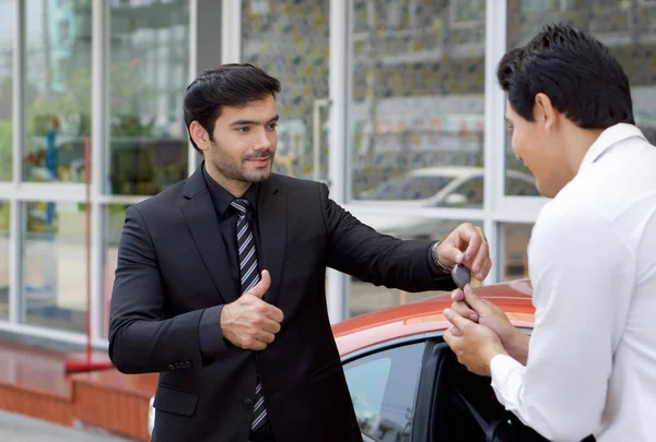 Persian Businessman Black Suit Smiles Thumbs While Handling Sport Car — Stock Photo, Image