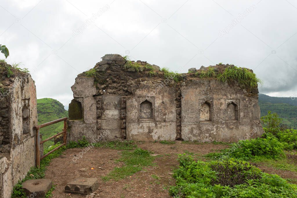 Walls of Hatgad fort in ruins, Nashik, Maharashtra, India.