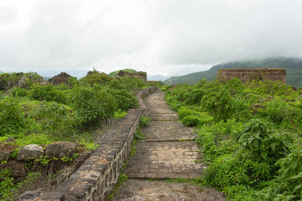 Walking stone pathway on the top of the Hatgad fort, Nashik, Maharashtra, India.