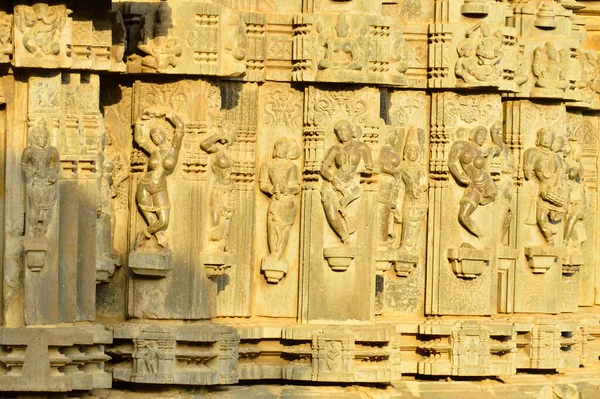 Dancing female sculptures on the exterior wall of Kopeshwar Temple, Khidrapur, Maharashtra, India