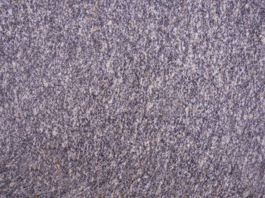 Parlatılmış granit kaplama dokusu. Taş deseni. Yakın plan..