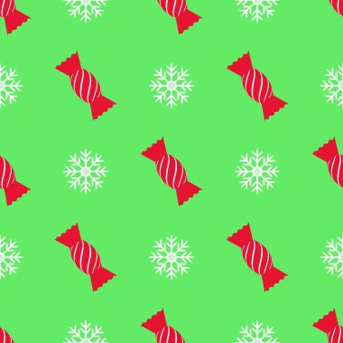 Karamelli Noel deseni, yeşil arka planda beyaz kar tanesi. Kış tatili kavramı.