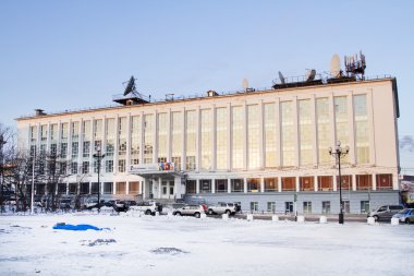 MAGADAN, RUSSIA - DECEMBER 19: Central Post Office Magadan and office Rostelecom on December 19, 2014 in Magadan. clipart