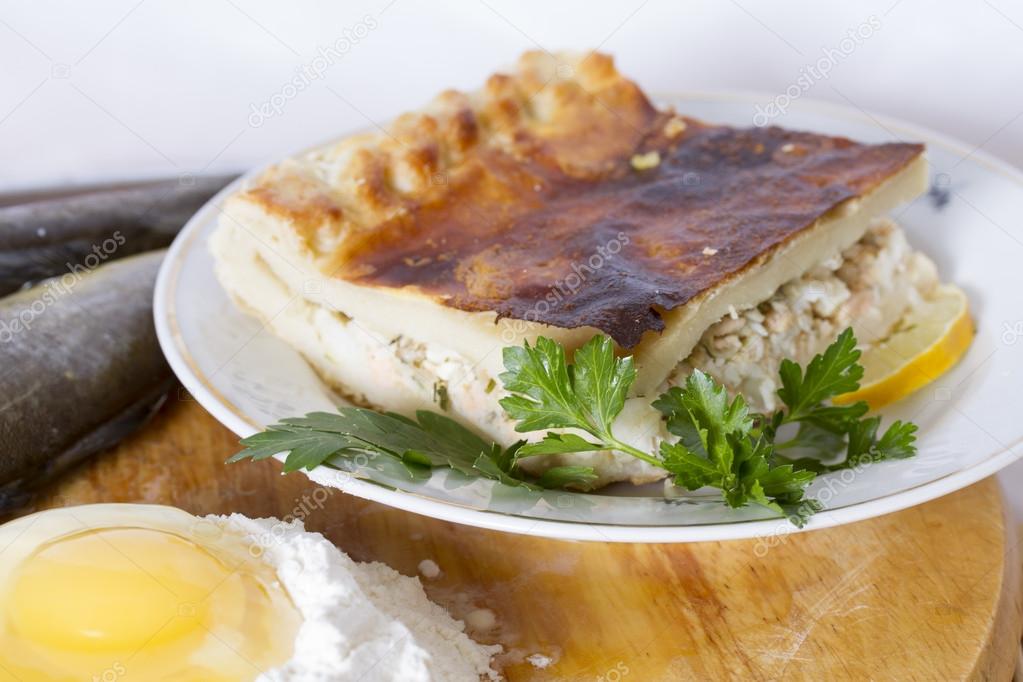 Fish pie of four fish species coho salmon, halibut, Arctic cisco