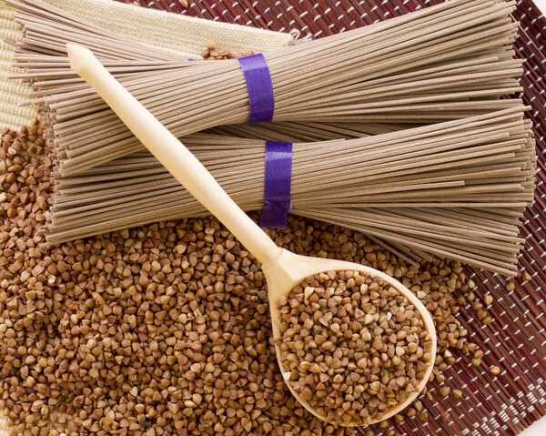 Wooden spoon about buckwheat and buckwheat noodles