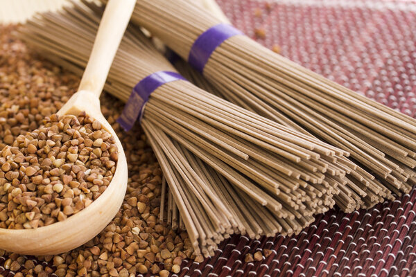 Wooden spoon about buckwheat and buckwheat noodles