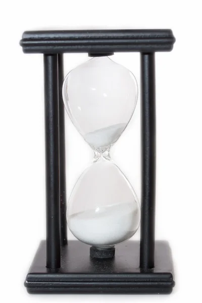 Reloj de arena sobre un fondo blanco — Foto de Stock