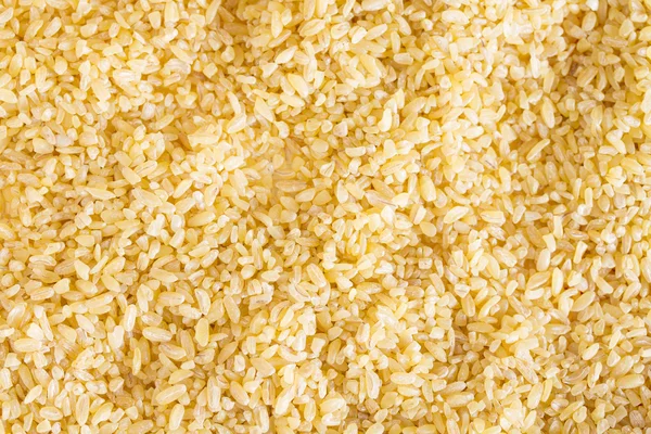 Background from grain bulgur — Stock Photo, Image