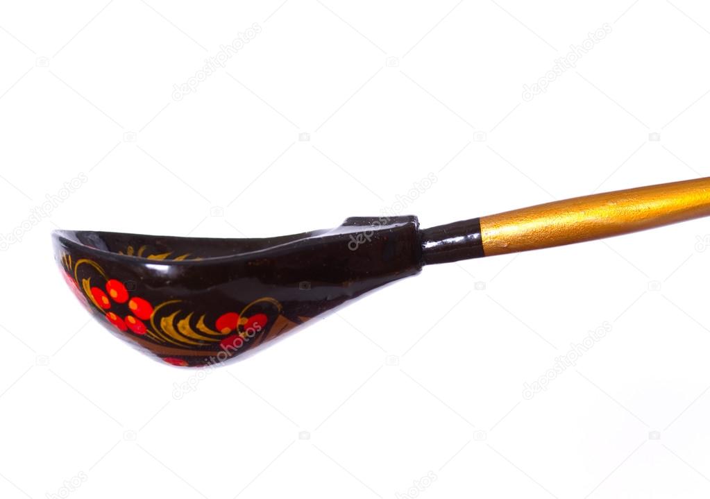 Traditional Russian wooden spoon on a white background