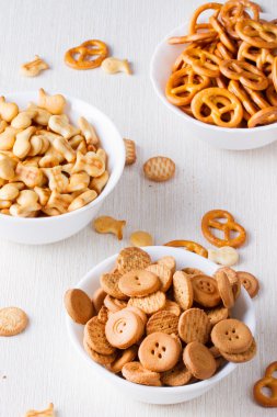 Four kinds of cookies in a vase on the table