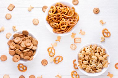 Four kinds of cookies in a vase on the table