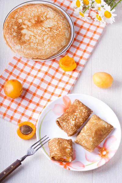 Pancakes with curd cheese and dried apricot — Stock Photo, Image