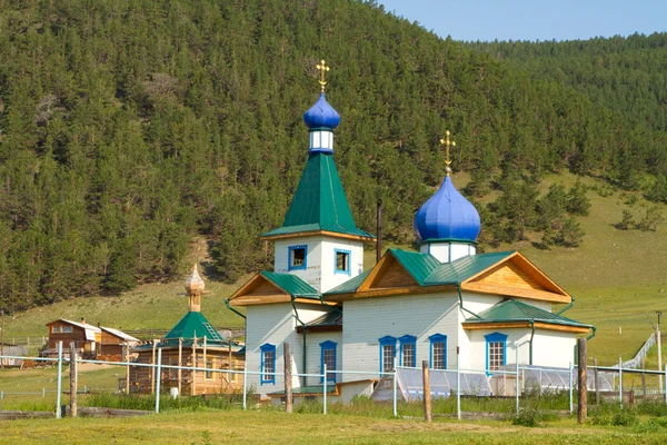 Small wooden church in the Grand Goloustnoe — Stock Photo, Image